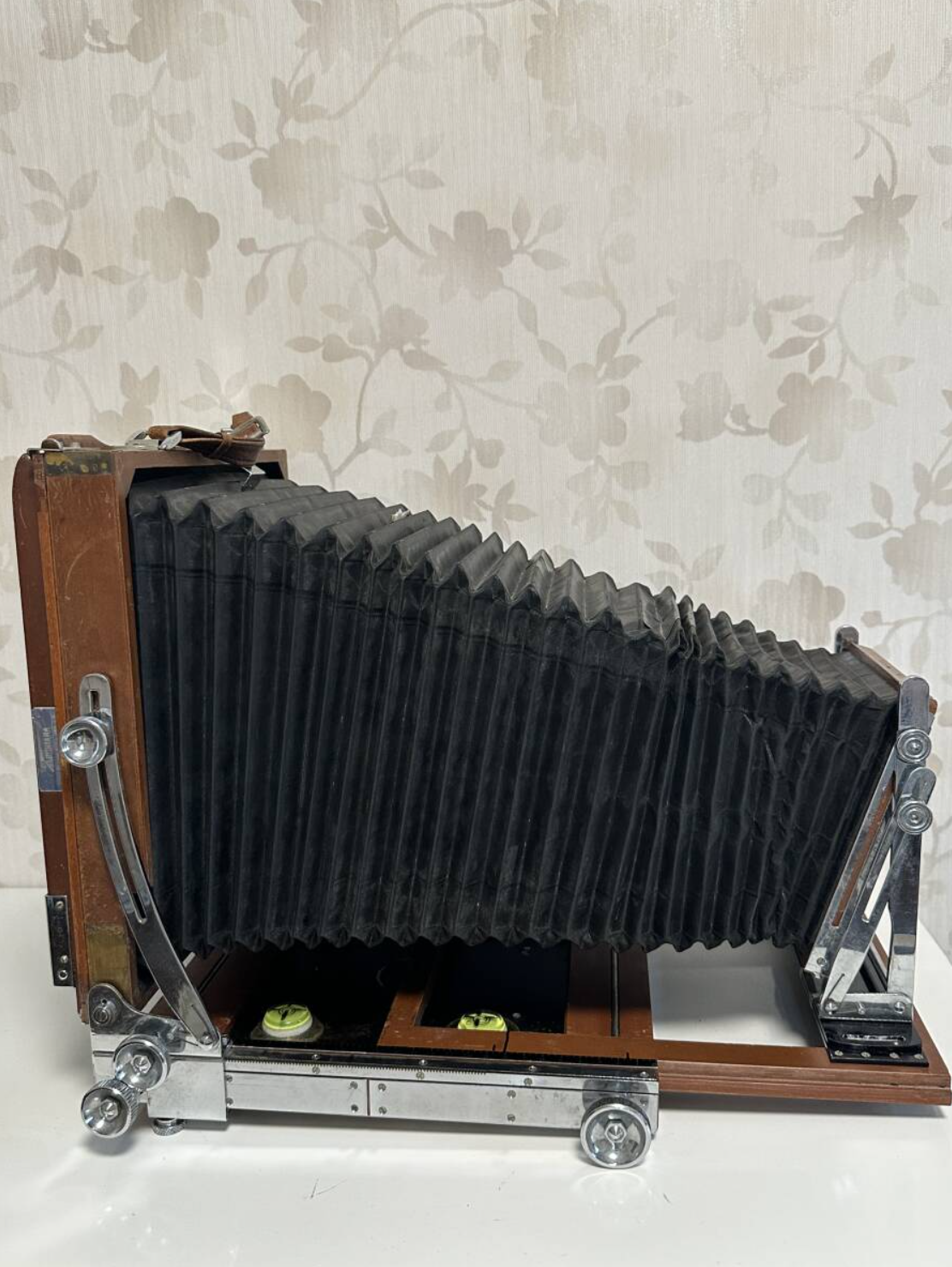 Side view of the Tachihara 8×10 before restoration, with its original black bellows extended.